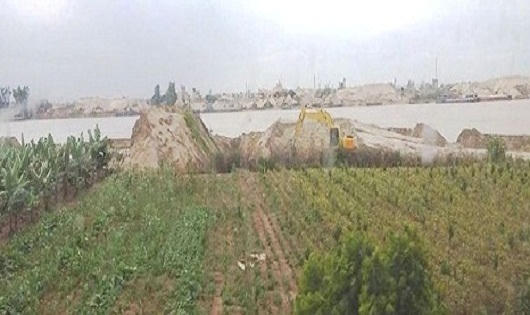 Ai chịu trách nhiệm trong việc doanh nghiệp núp bóng dự án làm “cát tặc”?