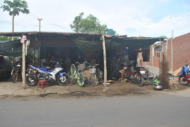 Hạnh phúc như mơ của ông chủ tiệm sửa xe tật nguyền