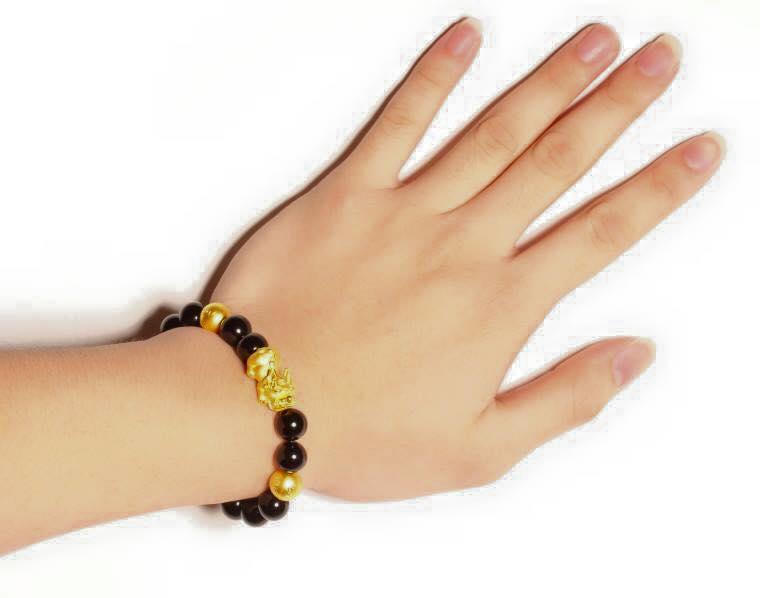 Mốt chơi vòng tay tỳ hưu vàng cầu tài lộc