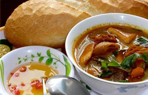 pha lau - mon an duong pho "an la nghien" o sai gon hinh anh 2