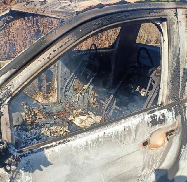 Xác định danh tính thi thể biến dạng trong xe bán tải bốc cháy - Ảnh 2.