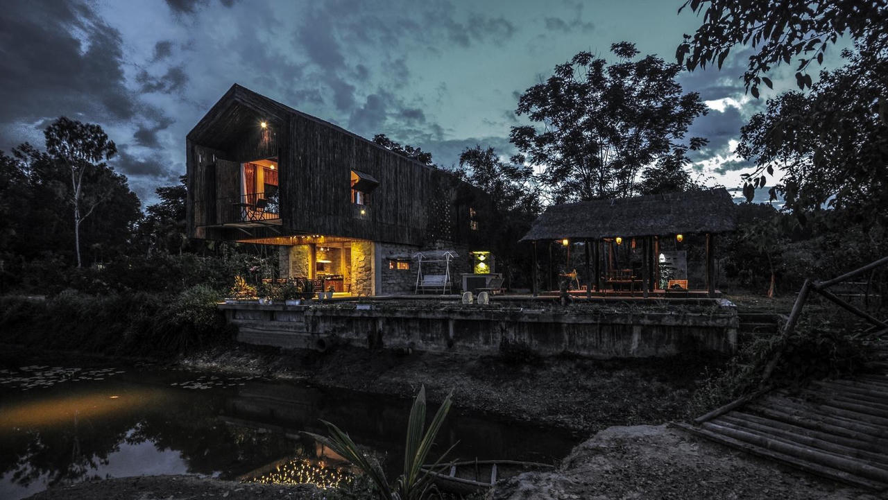 Không có điều hòa, nhà bên hồ ở Đà Nẵng vẫn mát mẻ nhờ lớp vỏ bằng tre ảnh 26