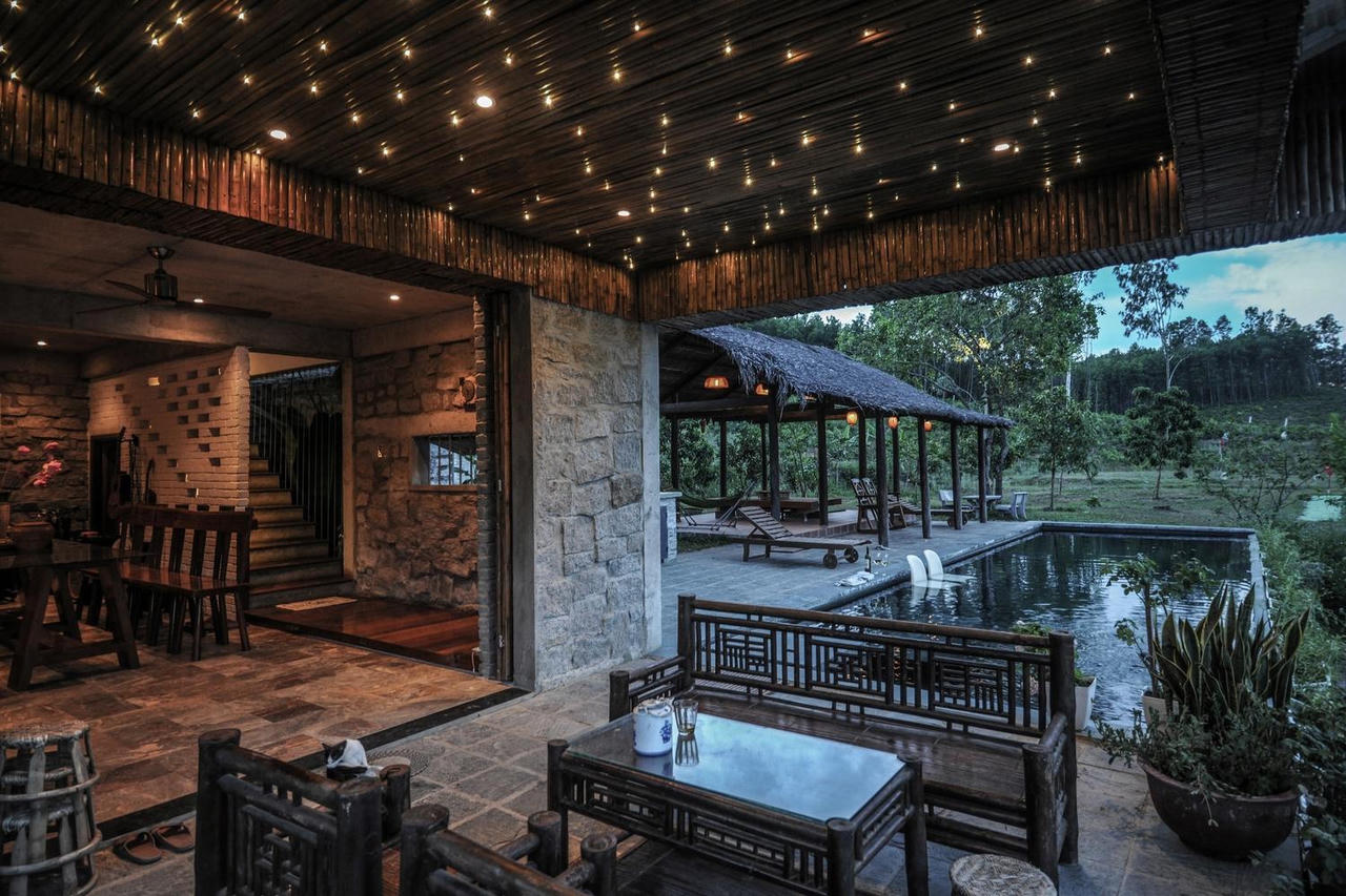 Không có điều hòa, nhà bên hồ ở Đà Nẵng vẫn mát mẻ nhờ lớp vỏ bằng tre ảnh 12