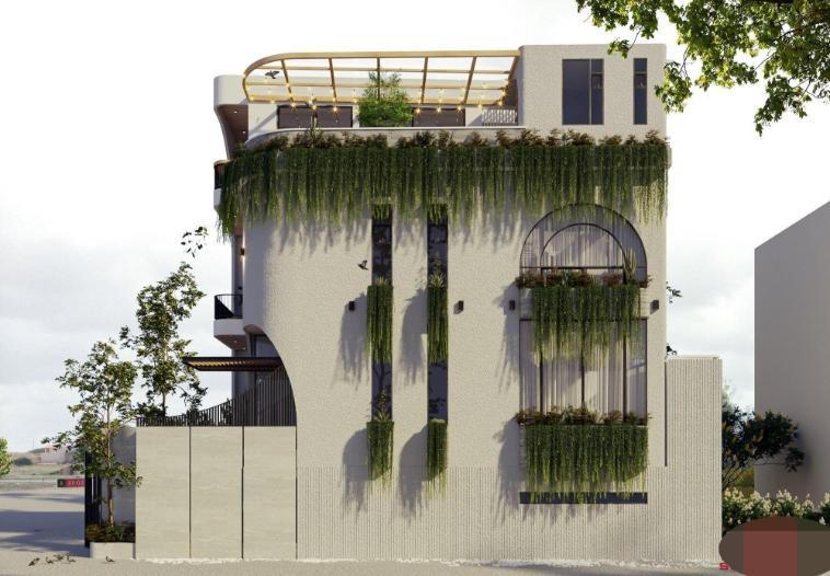 Rừng cây tươi tốt trong ngôi nhà giữa phố