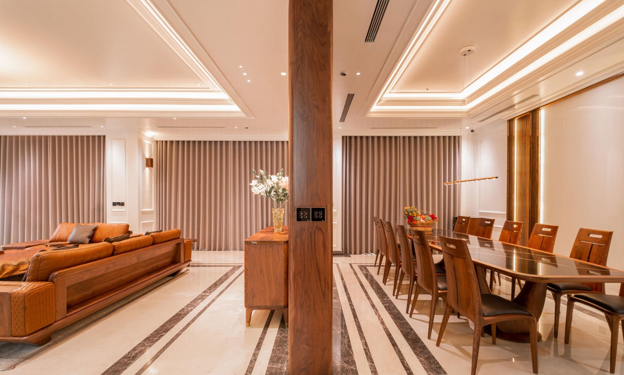 Căn biệt thự mang phong cách phóng khoáng pha lẫn nét cổ điển từ vật liệu gỗ óc chó, da bò tự nhiên và đá