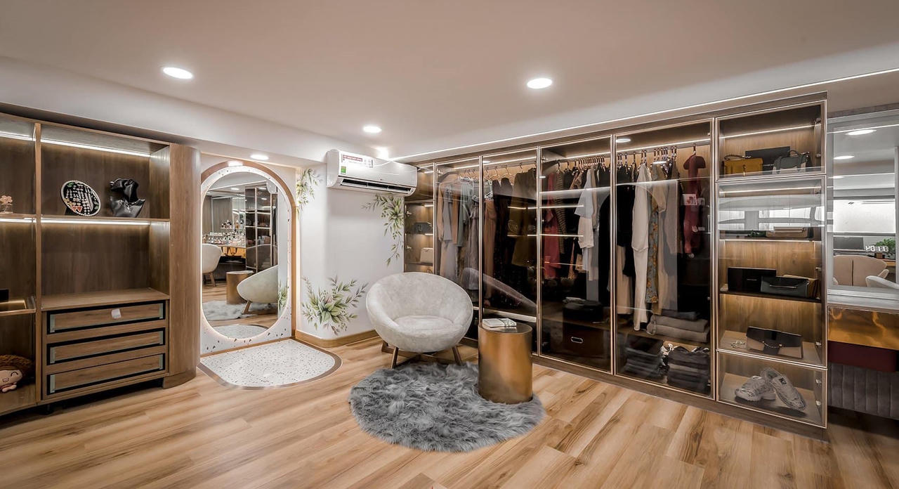 Căn hộ Duplex nổi bật với thiết kế đường cong và tông màu trắng sang trọng