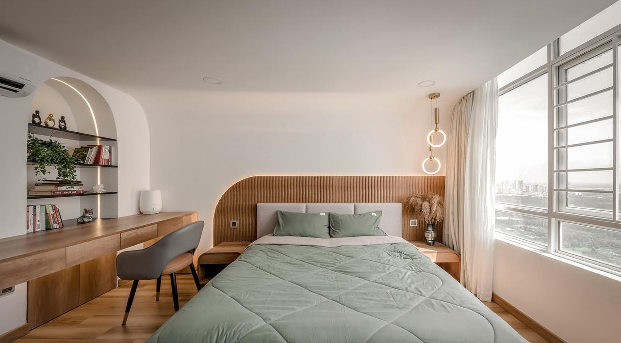 Căn hộ Duplex nổi bật với thiết kế đường cong và tông màu trắng sang trọng