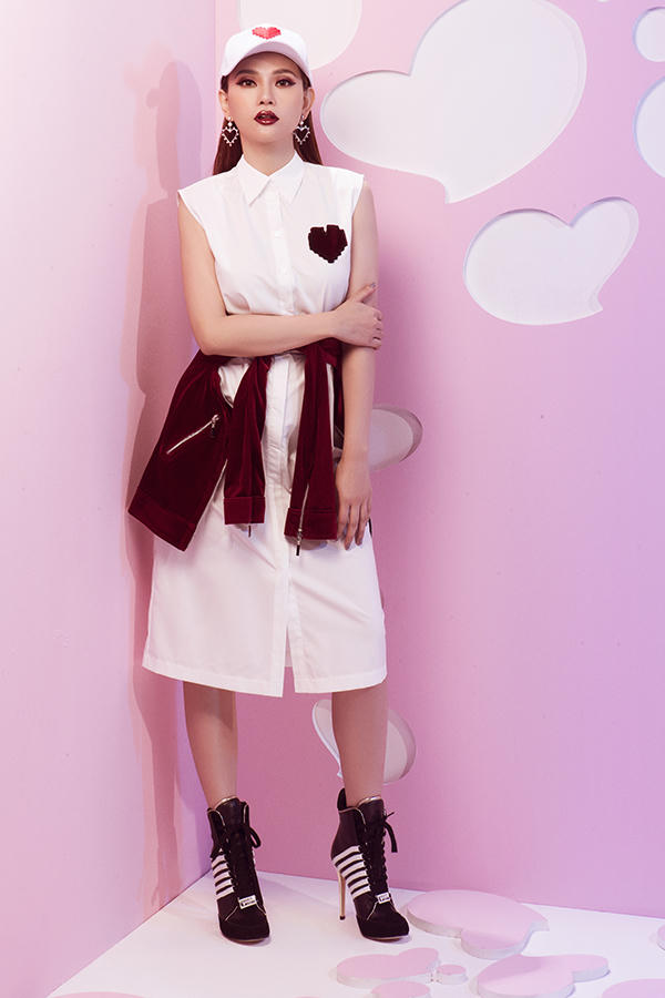 Nhà mốtsử dụng 3 tông màu trắng đỏ đen cùng các kiểu váy áo phá cách để xây dựng bộ sưu tập xuân 2018.