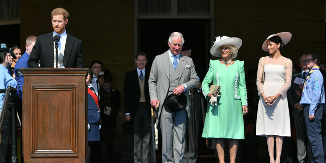 Vợ chồng Harry - Meghan góp mặt trong buổi tiệc như một sự kiện hoàng gia chính thức họ tham dự sau cưới. Ảnh: Harpers Bazaar.