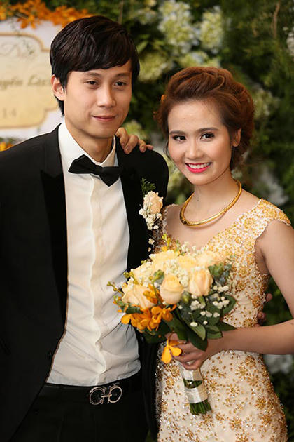 Huyền Lizzie và chồng cũ trong đám cưới năm 2014.