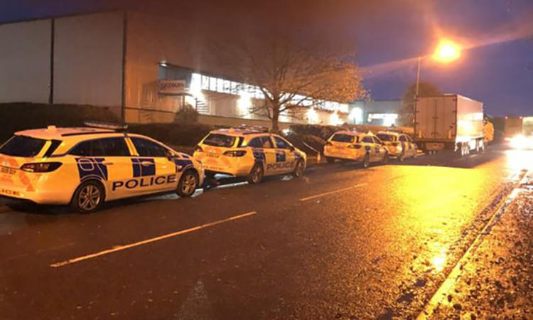 Hiện trường nơi phát hiện 10 người trong xe container ởCambridgeshire, Anh hôm 26/11. Ảnh: BBC.