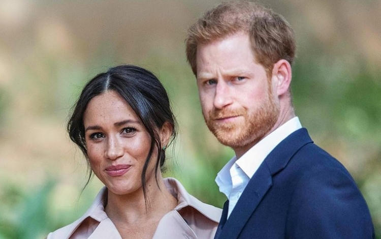 Harry và Meghan trong một chuyến thăm tới Johannesburg, Nam Phi, hồi tháng 10/2019. Ảnh: AFP.