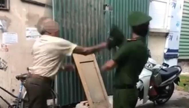 Phạt cụ ông dùng mũ cối đập vào mặt công an 2 triệu đồng