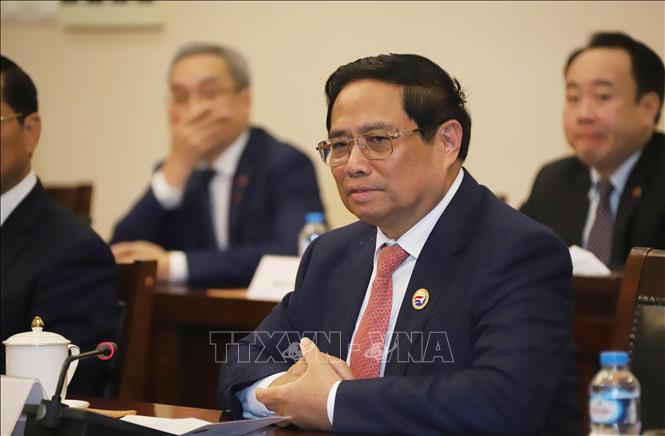 Thủ tướng Phạm Minh Chính hội kiến Thường trực Ban Bí thư, Phó Chủ tịch nước Lào