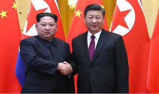 Nhà lãnh đạo Triều Tiên Kim Jong Un lần đầu công du nước ngoài