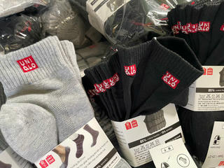 Lực lượng QLTT TP Hà Nội phát hiện hơn 16.000 đôi tất giả nhãn hiệu nổi tiếng