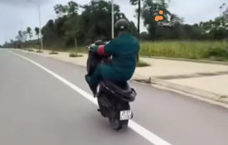 Nam thanh niên mặc áo dân quân tự vệ lái xe 'bốc đầu' ở Lào Cai xử phạt