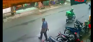 Công an xác minh người đàn ông trung niên cầm súng đi trên đường ở TP.HCM