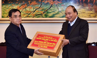 Việt Nam luôn ủng hộ Lào phát triển