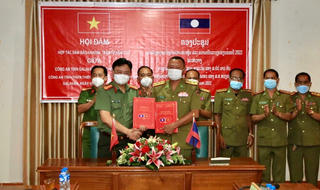 Ký kết biên bản ghi nhớ hợp tác an ninh Việt Nam - Lào
