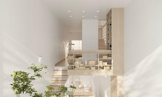 Ngôi nhà ẩn mình dưới tán cây xanh, mang âm hưởng mùa hè sôi động