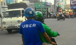Thương vụ Grab thâu tóm Uber:  Chuyên gia pháp lý nói gì?