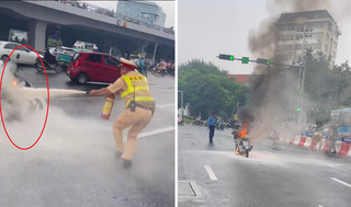 CSGT Hà Nội kịp thời dập tắt ngọn lửa từ chiếc xe tay ga bốc cháy