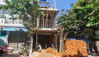 Bị đình chỉ vì xây dựng vượt phép, công trình vẫn được thi công