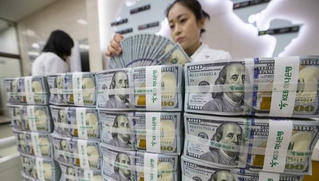 Tỷ giá ngoại tệ hôm nay 22/12: Tỷ giá trung tâm tăng, Ngân hàng thương mại đi ngang