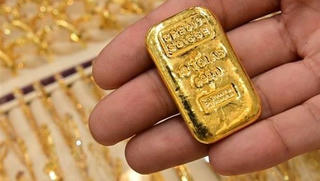 Giá vàng lao dốc sau khi Tổng thống Mỹ Donald Trump ký thông qua dự luật cứu trợ Covid-19