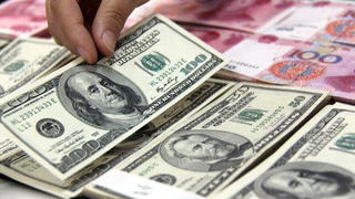 Tỷ giá trung tâm giảm mạnh