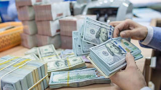 Dừng đà tăng nóng, đồng USD quay đầu giảm