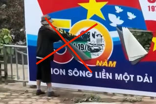 Người phụ nữ phá hoại banner chào mừng đại lễ 30/4 có dấu hiệu tâm thần
