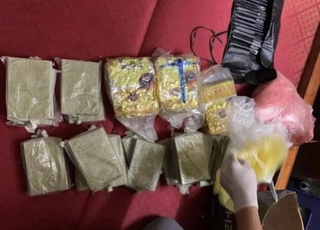 Thu giữ va ly tiền cùng hàng chục bánh heroin của trùm ma túy