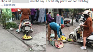 Xôn xao chuyện người phụ nữ cố tình chèn xe vào mẹt hoa quả của bà hàng rong