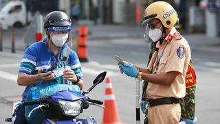 Người dân cần giấy tờ gì khi đi đường TP HCM sau ngày 1/10?