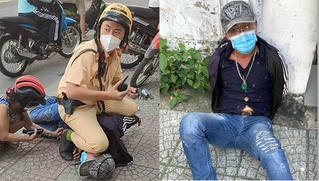 Đâm người phụ nữ gục xuống vỉa hè, gã đàn ông bị cảnh sát khống chế