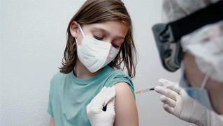 Trẻ 5-11 tuổi tiêm vaccine COVID-19 có thể gặp tác dụng phụ nào?