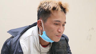 Vây bắt kẻ trốn nã mang súng đến cướp ngân hàng ở Bình Dương