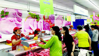 TP HCM bàn giải pháp bình ổn giá thịt lợn