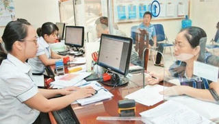 Thí điểm mô hình chính quyền đô thị tại Hà Nội: Nên quy định cứng 15 biên chế cho một phường?