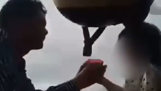 Xác minh clip người cha nghi ép con gái uống thuốc độc