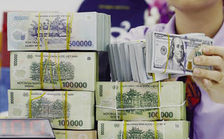 Điều chỉnh biên độ tỷ giá giao ngay giữa đồng Việt Nam và USD