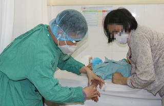 Bé trai bị chó tấn công tổn thương vùng đầu