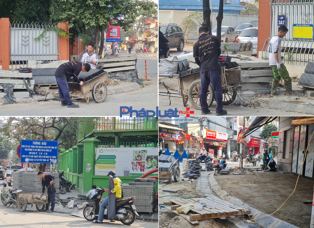 Công nhân thi công lát vỉa hè tại tuyến phố Thịnh Liệt.