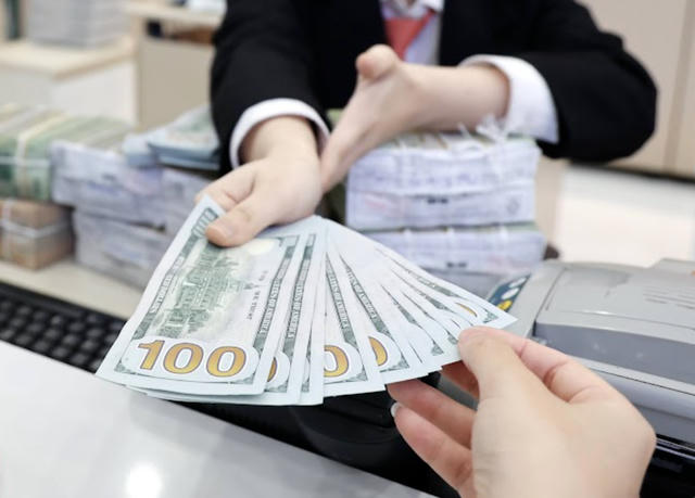 Tỷ giá USD/VND hạ nhiệt, thị trường tự do lùi sâu dưới mốc 26.000 đồng