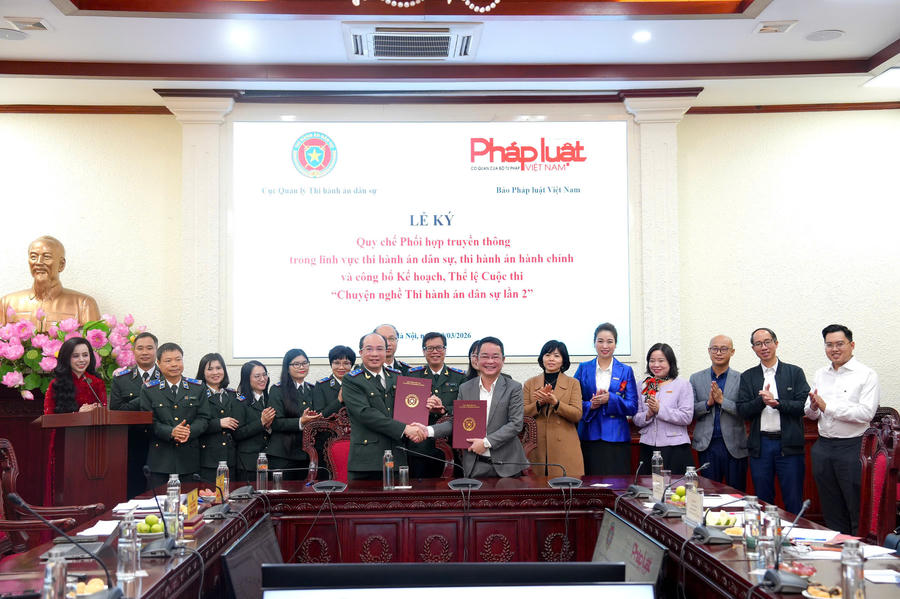 Lãnh đạo hai đơn vị ký kết Quy chế Phối hợp truyền thông. (Ảnh trong bài: PV)