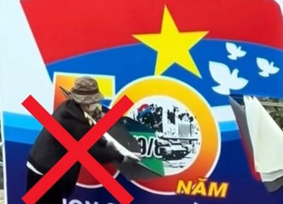 Người phụ nữ rạch tấm biển pa nô có biểu hiện tâm thần.
