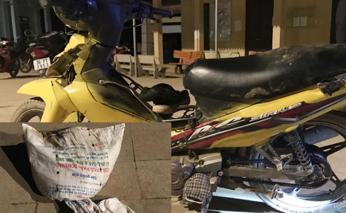 Chiếc xe máy cùng tang vật trộm chó bị bắt giữ. (Ảnh: CA Thanh Hóa)