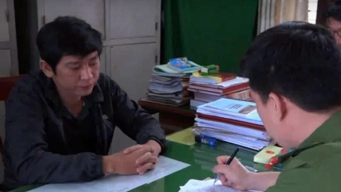 Trần Việt Thành tại cơ quan Công an.